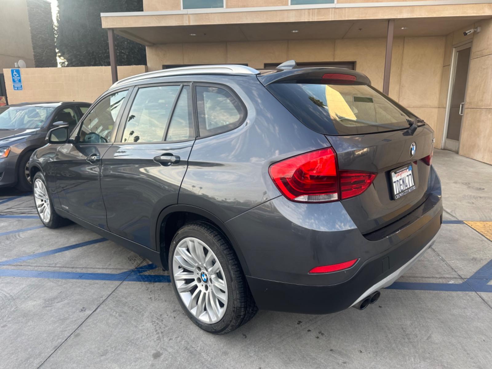 2014 Gray /black BMW X1 leather (WBAVM1C58EV) with an 4 CYLINDER engine, Automatic transmission, located at 30 S. Berkeley Avenue, Pasadena, CA, 91107, (626) 248-7567, 34.145447, -118.109398 - Photo #3